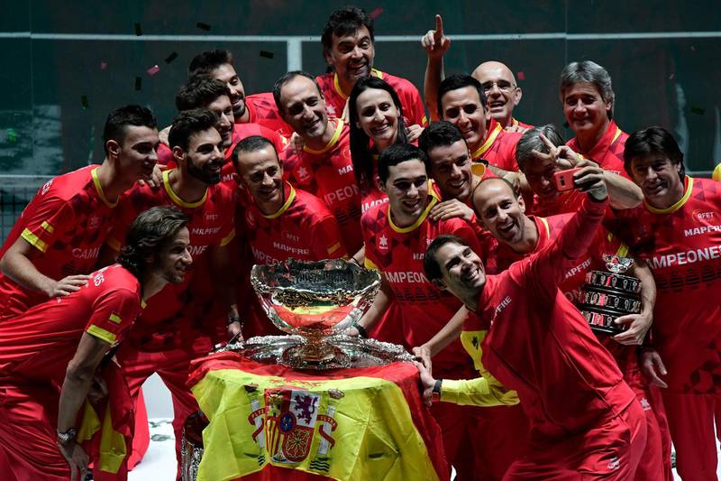 The Spanish team celebrate after beating Canada in the Davis Cup final. AFP