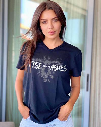 Algerian actress Amel Bouchoucha wearing Zuhair Murad's Rise from the Ashes T-shirt. Instagram / amelbouchoucha