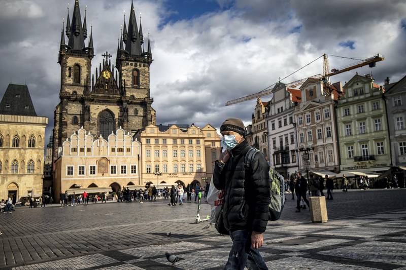 PRAGUE, CZECH REPUBLIC - MARCH 12: Tourist wearing face masks are seen at the Old Town Square on March 12, 2020 in Prague, Czech Republic. The government of the Czech Republic has declared a 30-day state of emergency due to the coronavirus outbreak. Czech Ministry of Health confirmed several dozens cases of COVID -19 on March 12, 2020 in the Czech Republic. (Photo by Gabriel Kuchta/Getty Images)