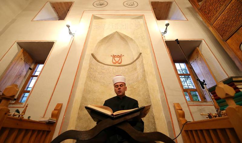 A Bosnian Muslim Imam leads a prayer during the Muslim festival Eid Al Adha at a mosque in Kraljeva Sutjeska near Kakanj, Bosnia and Herzegovina.  Reuters