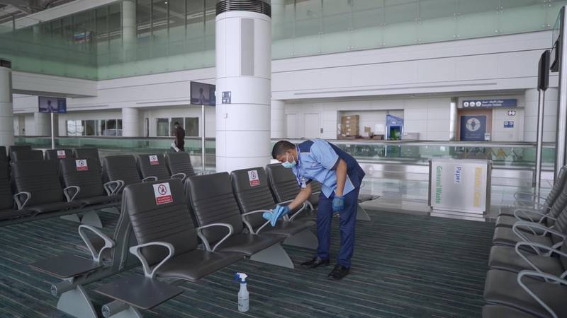Staff dust off the terminal ahead of it reopening on Thursday