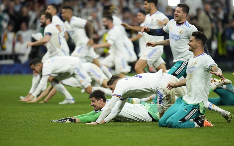 Real Madrid players celebrate at the end of the match. AP