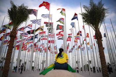 A Brazilian takes a breather at the Flags Square. AFP
