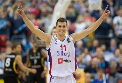 Serbia's Nemanja Bjelica of the Minnesota Timberwolves cheers after a EuroBasket 2015 victory on Sunday. Lukas Schulze / EPA
