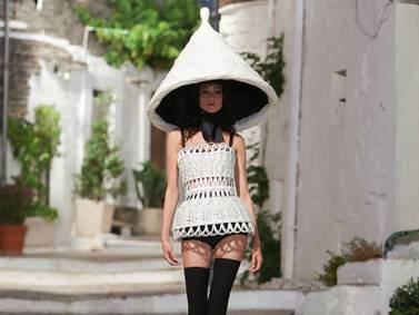 A conical headpiece inspired by the shape of Alberobello's roofs
