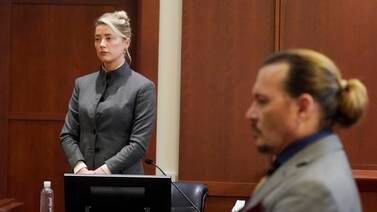 An image that illustrates this article Heard says during trial that Depp struck her on their honeymoon