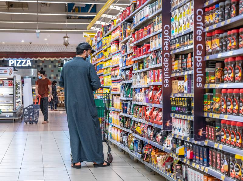 A man shops for coffee at Lulu Hypermarket. 