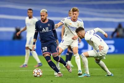 Neymar battles for possession with Toni Kroos and Federico Valverde. Getty