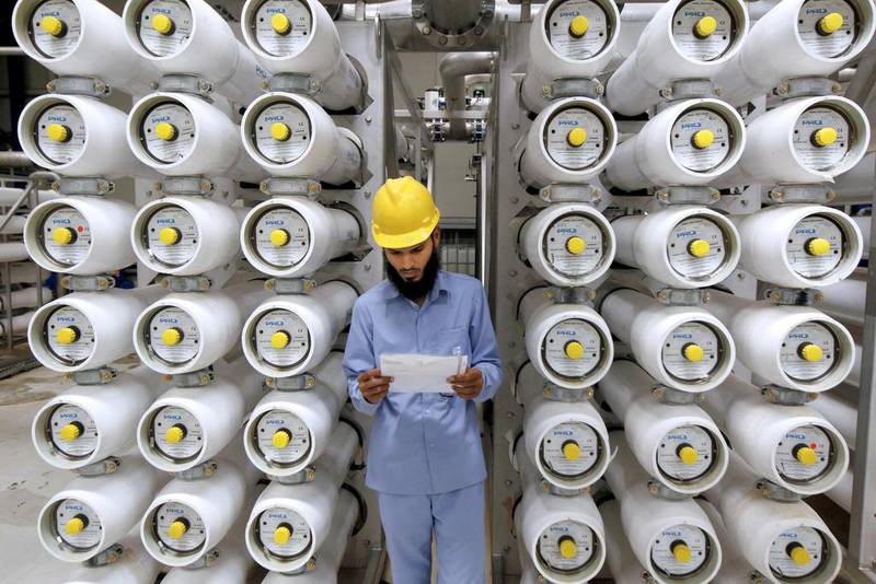 A worker stands at a desalination plant in Riyadh, Saudi Arabia. Fahed Shadeed / Reuters 