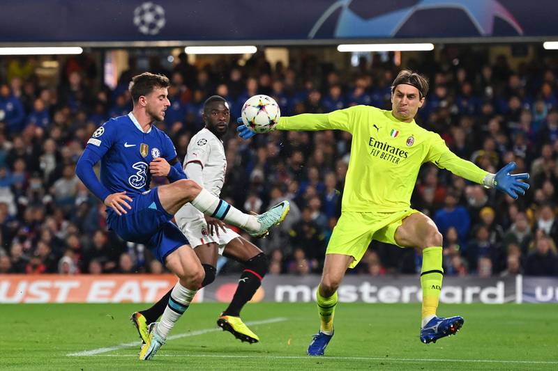 Chelsea's Mason Mount lobs AC Milan goalkeeper Ciprian Tatarusanu to score but the goal was ruled out for offside. AFP