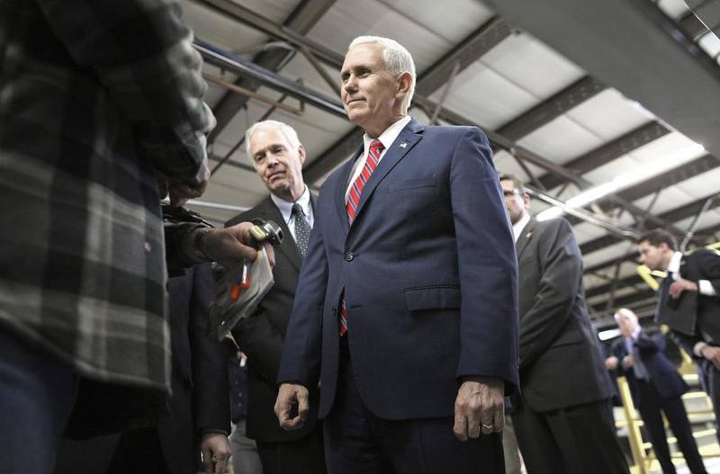 The US vice president, Mike Pence, takes a short tour of the Blain Supply's company headquarters and warehousing facility during his visit to Janesville. Anthony Wahl / The Janesville Gazette via AP