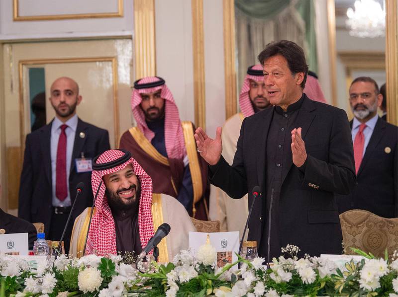 epa07378543 A handout photo made available by the Saudi Royal Court shows Pakistan's Prime Minister Imran Khan (R) speaking next to Saudi Crown Prince Mohammad Bin Salman (L) during a reception in Islamabad, Pakistan, 17 February 2019 (issued 18 February 2019). The crown prince of Saudi Arabia arrived on 17 February in Pakistan, where he is expected to announce multi-billion-dollar investments to help the kingdom's traditional ally tide over financial crisis amid declining foreign exchange reserves.  EPA/BANDAR ALGALOUD HANDOUT  HANDOUT EDITORIAL USE ONLY/NO SALES