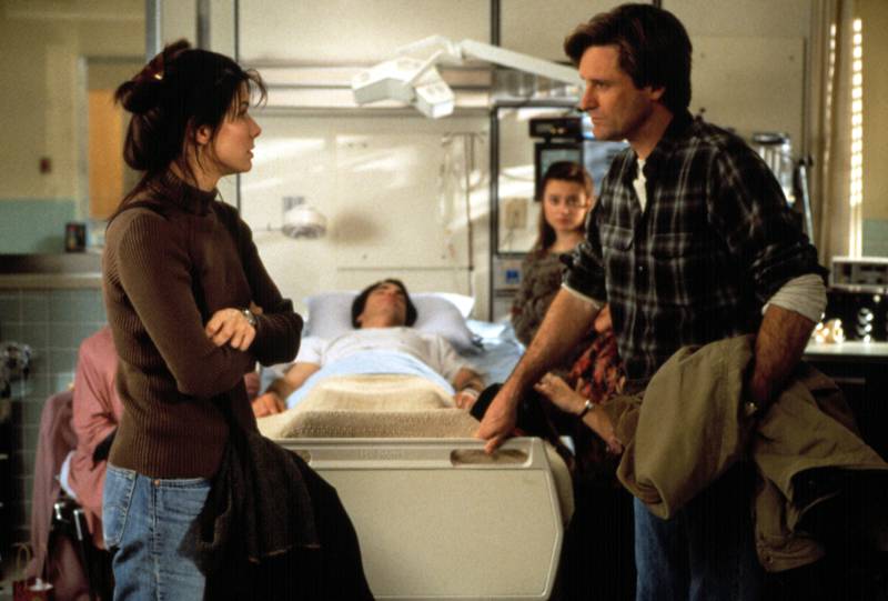 Sandra Bullock as Lucy and Bill Pullman as Jack in While You Were Sleeping. Photo: Buena Vista Pictures