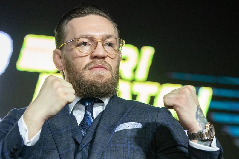 UFC (Ultimate Fighting Championship ) fighter Conor McGregor smiles during a news conference in Moscow, Russia, Thursday, Oct. 24, 2019. McGregor announced that he will fight an undisclosed opponent with the event expected to happen in Las Vegas, USA, in January 2020.  (AP Photo/Pavel Golovkin)