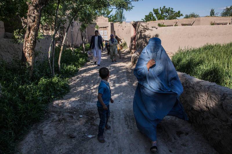 In rural Herat, many people opt for 'alternative justice' - in government areas this can mean seeking help from local elders and mullahs, while in Taliban areas, it means going to a Taliban court. This village, Sultan Khan, is in a government-held area. Stefanie Glinski for The National