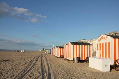 Striped seaside huts in De Panne on the coast of Belgium. Photo: John Brunton