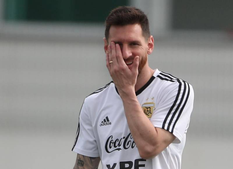 Argentina's Lionel Messi smiles during training ahead of the Copa America quarter-final with Venezuela. Reuters