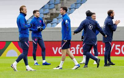 England captain Harry Kane and Michael Keane training with teammates. Reuters