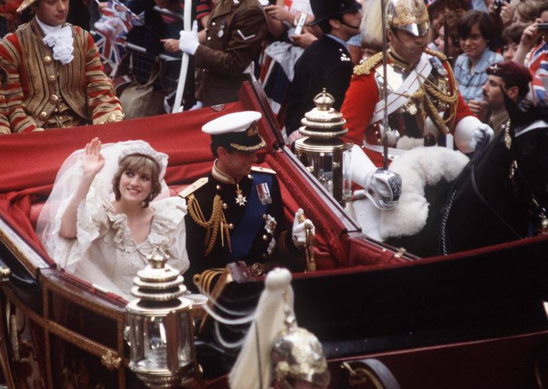 LONDON, UNITED KINGDOM - JULY 29:  Prince  Charles And Princess Diana Being Driven In An Open Carraige Back To Buckingham Palace.  The Princess Is Waving To The Crowds.  (Photo by Tim Graham/Getty Images)