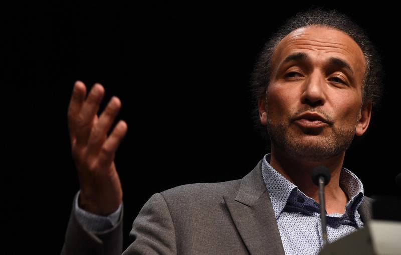 (FILES) This file photo taken on March 26, 2016 shows Swiss Islamologist Tariq Ramadan speaking a conference on the theme "Live together", on March 26, 2016 in Bordeaux, southwestern France.
Ramadan commented for the first time on late October 28, 2017 on two recent complaints of rape by posting a message on his Facebook page that denounced a 'campaign of slander' which was triggered by his 'enemies'. / AFP PHOTO / MEHDI FEDOUACH