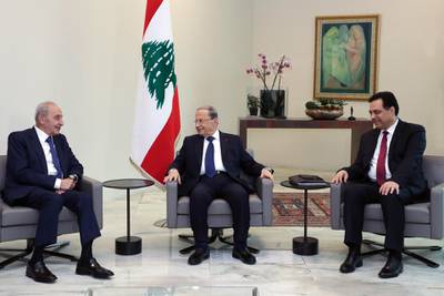 From left: Lebanon's Parliament Speaker Nabih Berri and President Michel Aoun meet with prime minister designate Hassan Diab at the presidential palace in Baabda, east of the capital Beirut. AFP