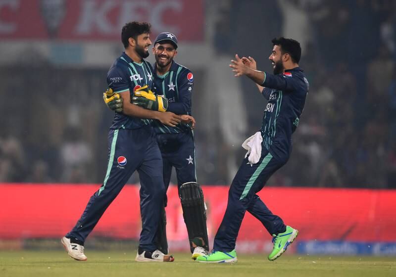 Pakistan pacer Aamer Jamal, left, bowled a great last over to secure victory in the fifth T20 against England at the Gaddafi Stadium in Lahore on Wednesday, September 28, 2022. Getty
