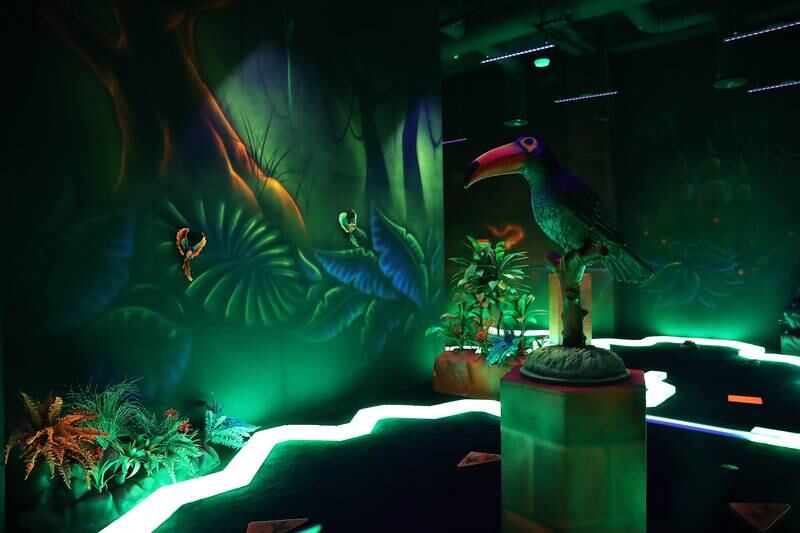 The nine-hole miniature golf course has glow-in-dark elements.