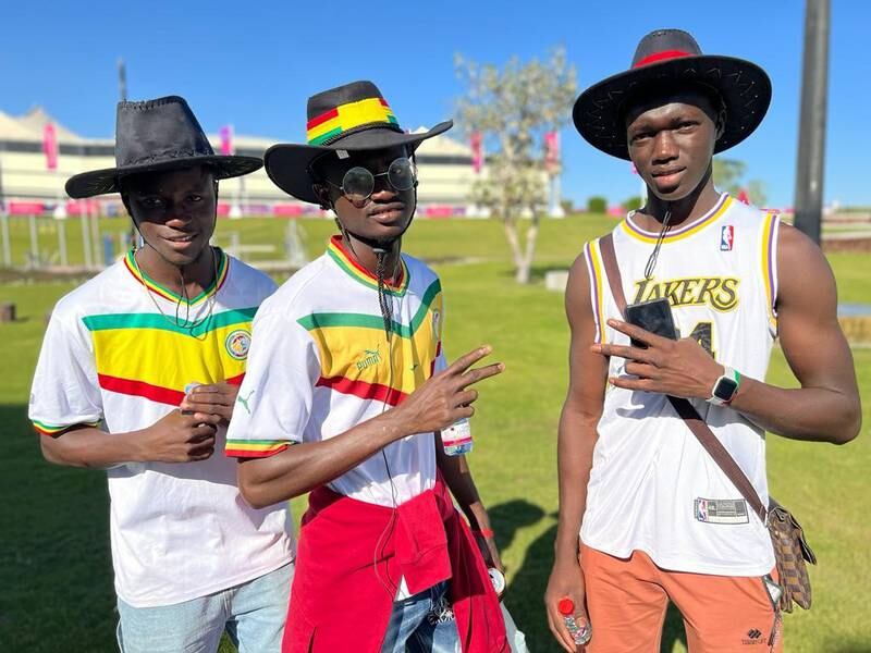 From left, brothers Olu, Ibrahim and Babou Njie from Senegal have been working in Doha during the World Cup. Andy Scott