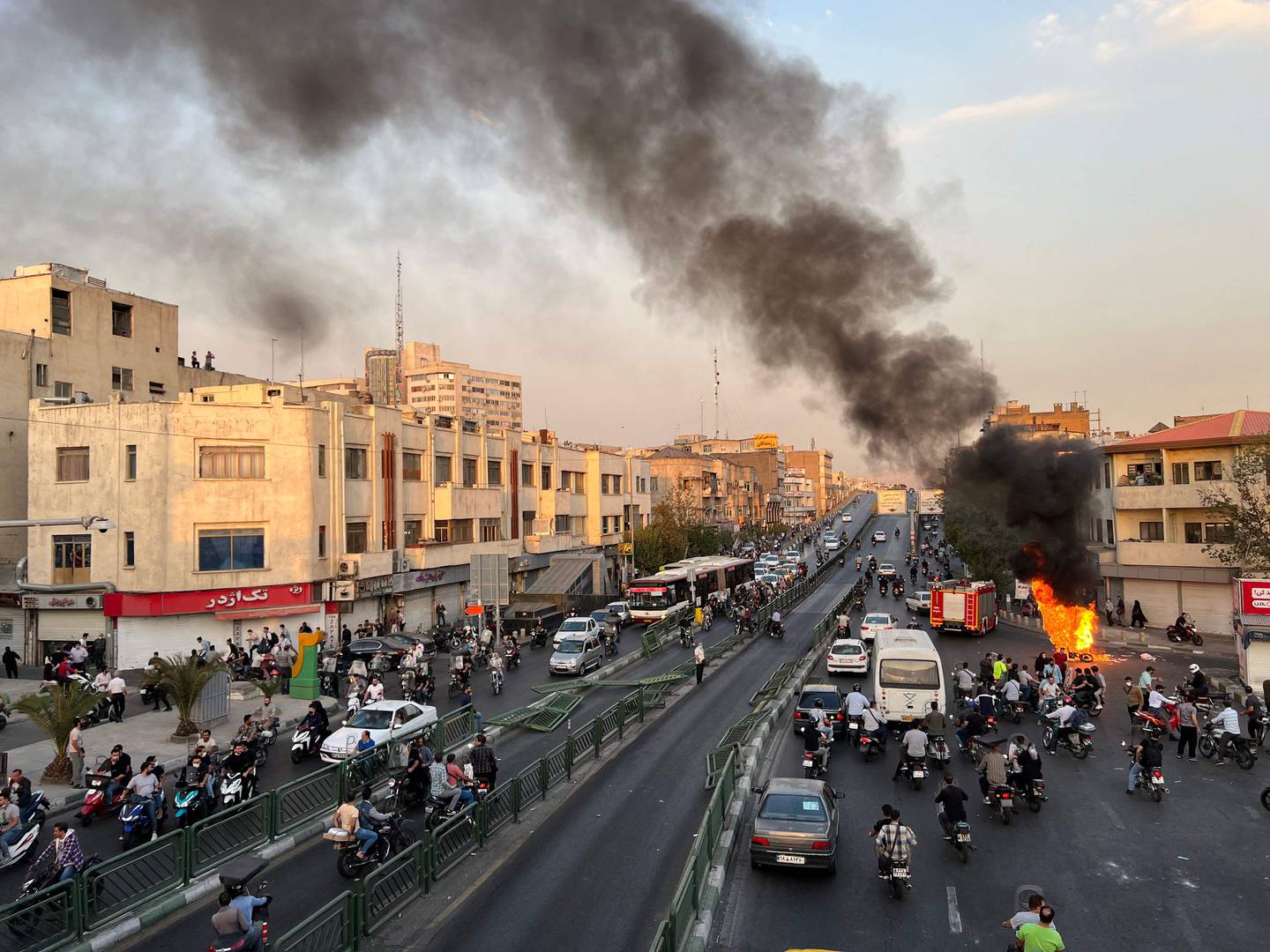 A motorcycle on fire in Iran's capital Tehran, amid the wave of nationwide protests against the government. AFP