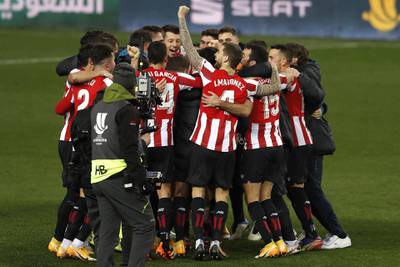 Athletic Bilbao's players celebrate winning the Spanish Super Cup semi final. EPA