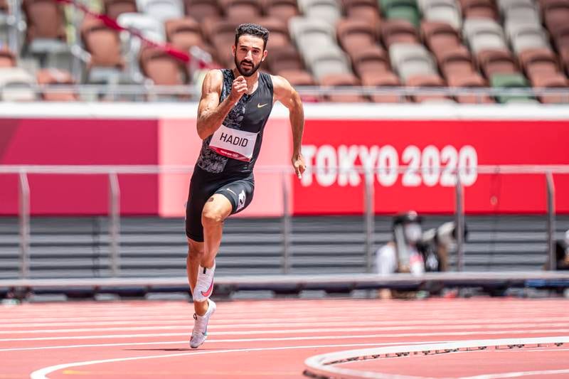Noureddine Hadid of Lebanon runs in the men's 200m heats at the Tokyo Olympic Stadium this morning. Christel Saneh for The National