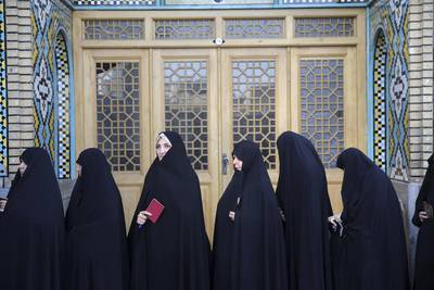 Female voters queue at a polling station in the Qom, Iran, for the presidential and municipal council elections. Iranians began voting Friday in the country’s first presidential election since its nuclear deal with world powers, as incumbent Hassan Rouhani faced a staunch challenge from a hard-line opponent over his outreach to the wider world. Ebrahim Noroozi / AP / May 19, 2017