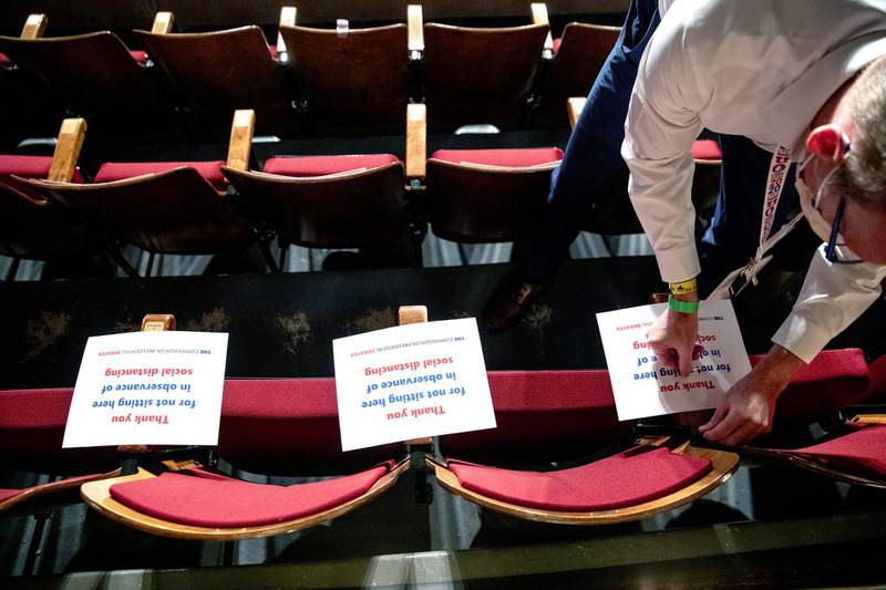 Social distancing signs on seats. Bloomberg