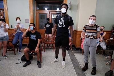 Black Lives Matter protesters chant during a demonstration outside Iowa Governor Kim Reynolds' office. AP Photo