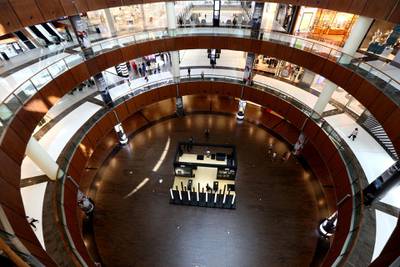 FILE PHOTO: A view shows the Dubai mall almost empty of customers, as precaution amid the outbreak of coronavirus, in Dubai, United Arab Emirates, March 16, 2020. Picture taken March 16, 2020. REUTERS/Satish Kumar/File Photo
