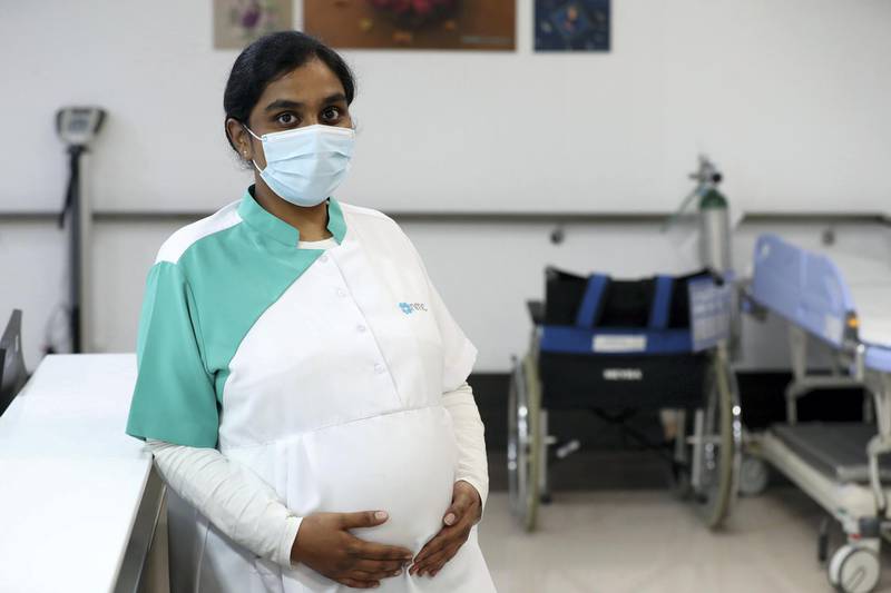 Dubai, United Arab Emirates - Reporter: N/A. News. Health. Photo Project. Nurse Ruth Deva Kiruba (who is pregnant) at the NMC Royal Hospital, DIP. Photo project on hospital staff that Covid-19, recovered and carried on treating patiences. Monday, July 27th, 2020. Dubai. Chris Whiteoak / The National