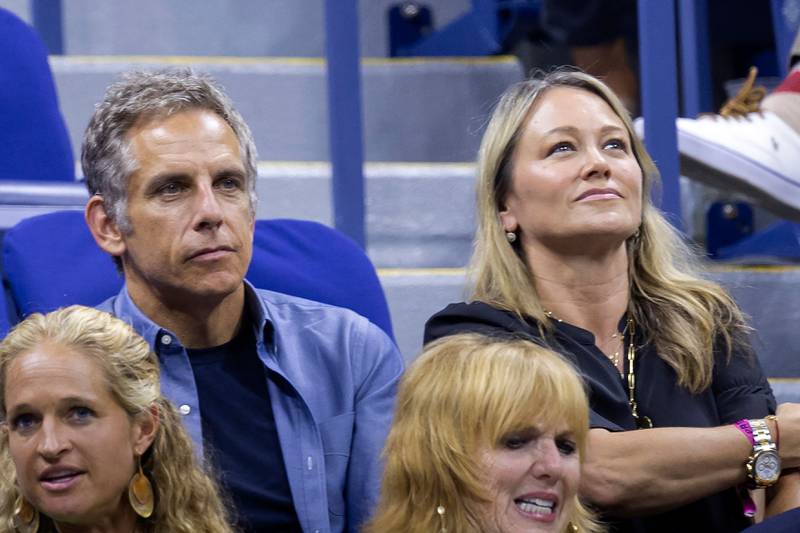 US actor-director Ben Stiller and his wife actress Christine Taylor watch from their seats. AFP
