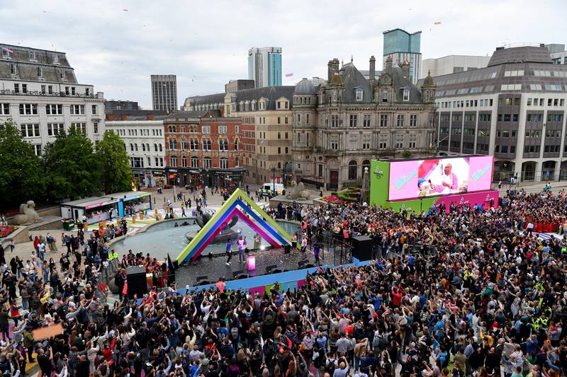 A packed Victoria Square Fan Festival area as Sir Lenny Henry takes part in the Queen's Baton Relay in Birmingham, before the start of the 2022 Commonwealth Games. Getty Images