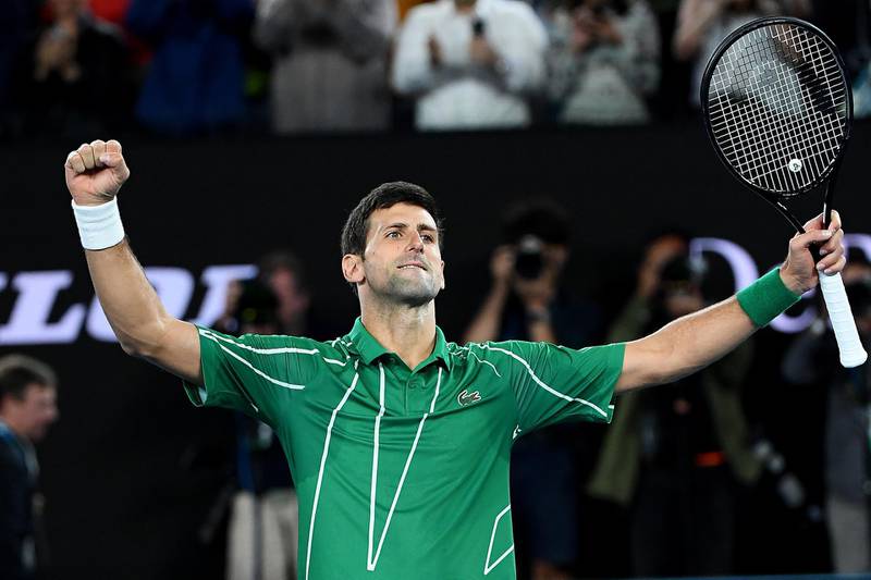 Novak Djokovic celebrates after clinching championship point. Getty