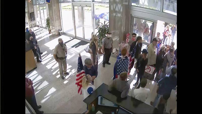 Security video from Arizona shows protesters gathering to contest the state's 2020 presidential vote certification. House select committee / AP