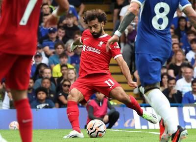Mohamed Salah 8: Whirlwind first half hour saw him curl shot with weaker right foot against bar, teed-up Dias for opening goal with superb ball and then had fine finish ruled out in tight offside call. Quieter second half but was furious at being substituted with 13  minutes left. EPA
