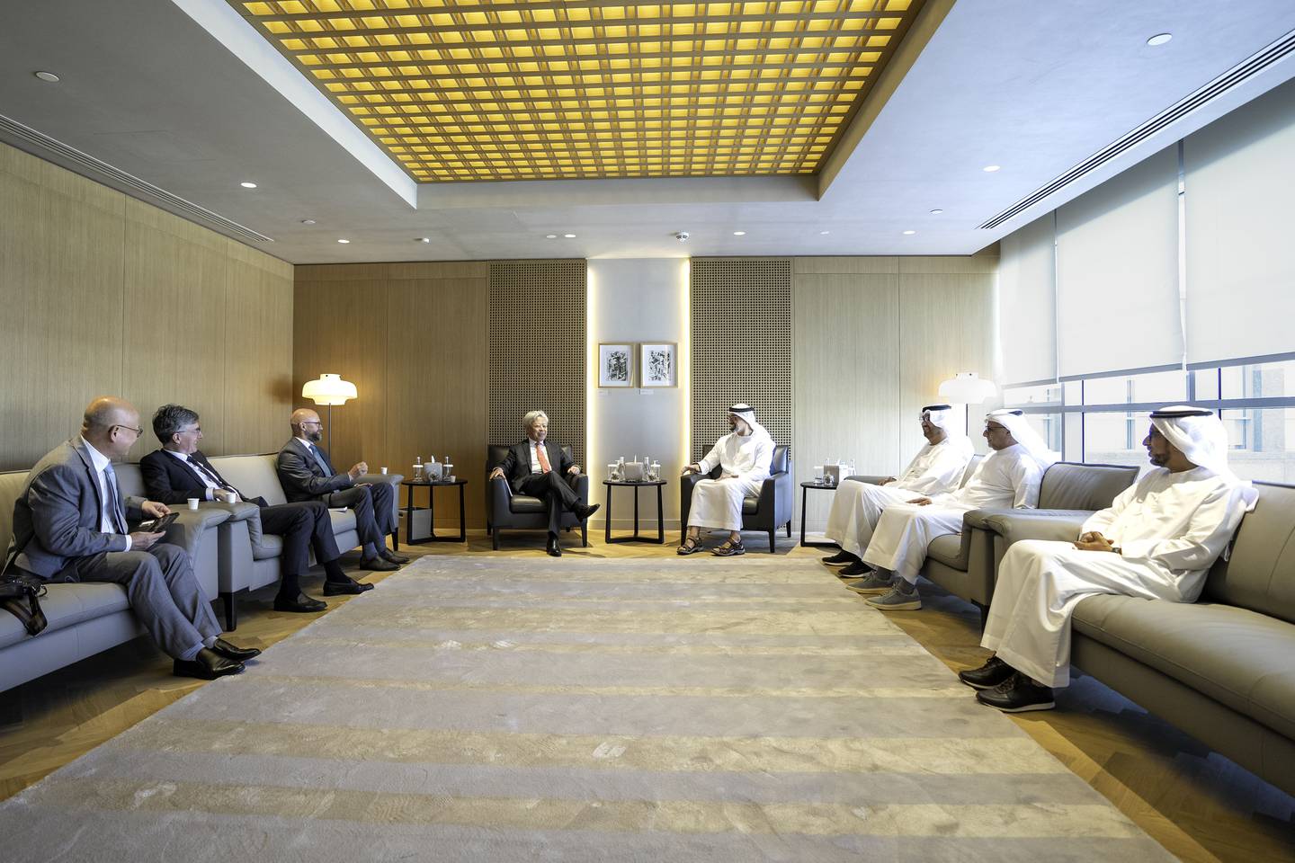Sheikh Khaled bin Mohamed with Jin Liqun, in a meeting also attended by Dr Sultan Al Jaber, Jassem Al Zaabi and Mohammed Al Suwaidi. Photo: Abu Dhabi Government Media Office
