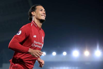 LIVERPOOL, ENGLAND - FEBRUARY 27: Virgil van Dijk of Liverpool celebrates after scoring their 4th goal during the Premier League match between Liverpool and Watford at Anfield on February 27, 2019 in Liverpool, United Kingdom. (Photo by Simon Stacpoole/Offside/Getty Images)