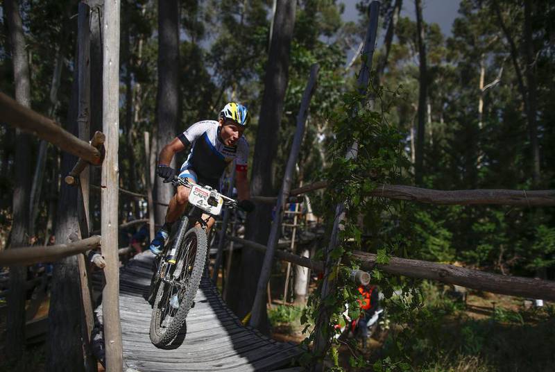 Urs Huber from Switzerland competes during Stage 2 of the Absa Cape Epic mountain bike race on Tuesday in South Africa. Nic Bothma / EPA