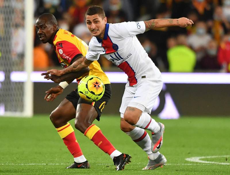 Lens' midfielder Gael Kakuta, left, fights for the ball with Paris Saint-Germain's midfielder Marco Verratti. AFP