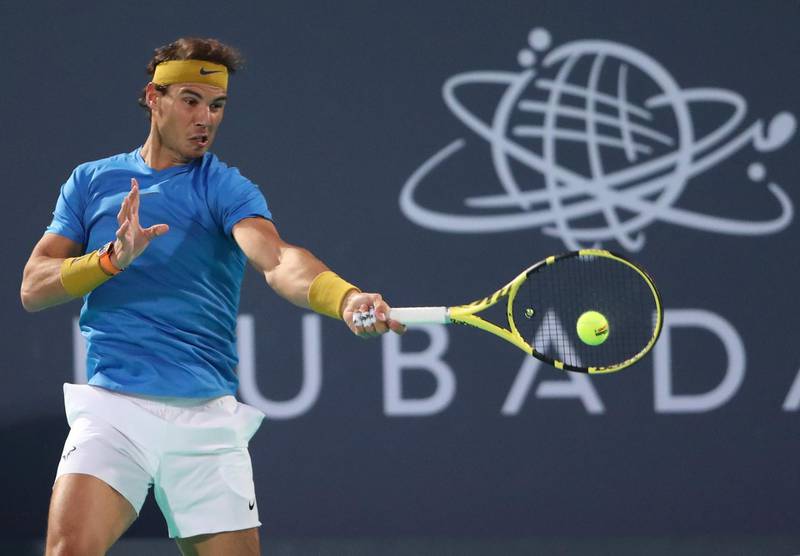 Rafael Nadal returns a ball to Kevin Anderson during their Mubadala World Tennis Championship semi-final in Abu Dhabi. Reuters