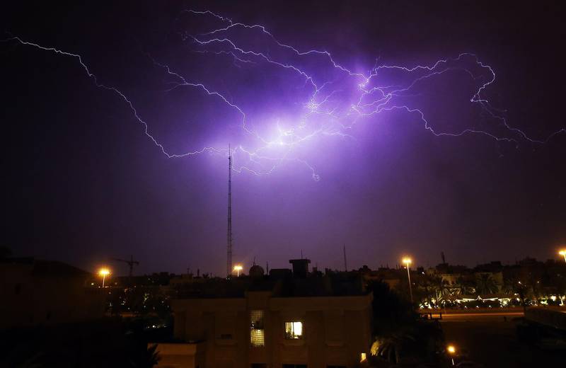 Lightning flashes in the sky over Rumaithiya district in Kuwait City during a storm.  AFP
