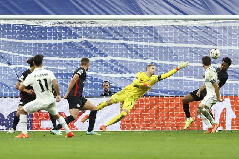 Real Madrid substitute Marco Asensio makes it 2-0 against Leipzig. EPA