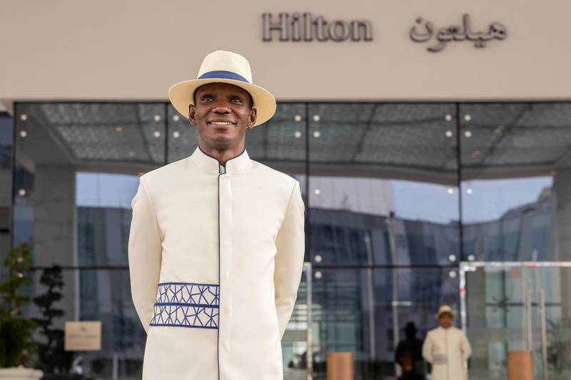A concierge welcomes guests at Hilton Abu Dhabi Yas Island. The American hotel chain puts a strong emphasis on service and encourages its staff to be friendly, chatty and personable. Courtesy: Hilton