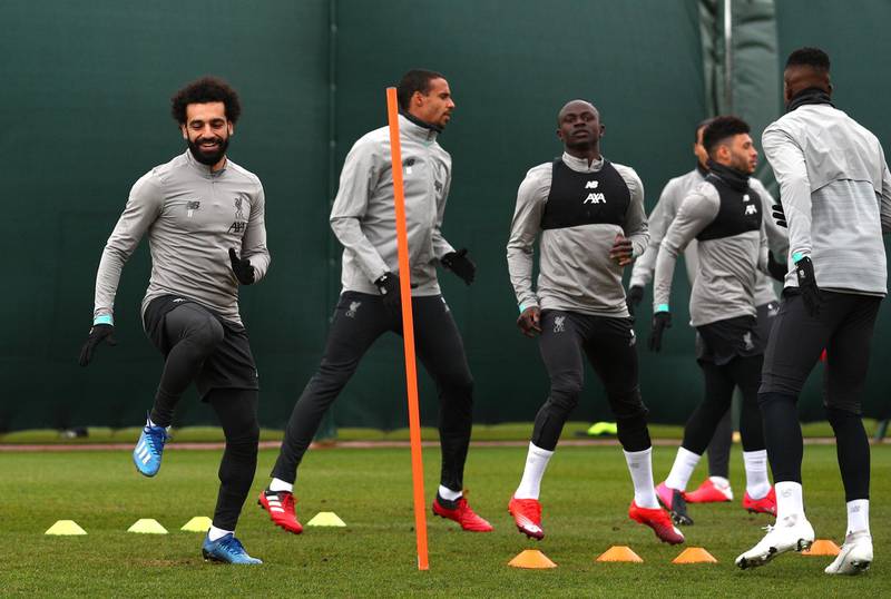 Mohamed Salah, left, trains with his Liverpool teammates ahead of their Champions League last-16 second leg against Atletico Madrid. Getty